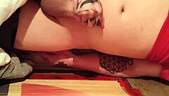 Petite brunette gets down on her knees for a handjob