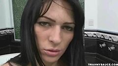 Busty brunette shemale babe engages in solo activity with her body