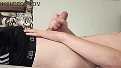 Young German gay man pleasures himself in Adidas sweatpants