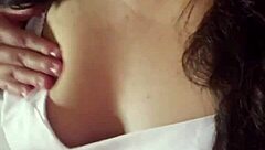 dancing in red panties showing small tits.