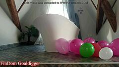 balloons in bathroom with stockings legs