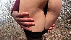 kadavak's perfect ass touches herself in woods