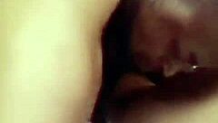 Two lovers cuddling and pleasuring each other by touching and kissing.
