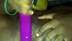 Horny slut fucks pussy and asshole with toy at midnight