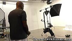 busty babe hints at riding that massive black cock in lingerie, teasing a facial finish after handjob