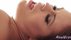 Beautiful woman in stockings has anal sex in a spoon position.