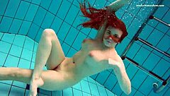 Young Czech woman Vesta strips before she gets into the pool.