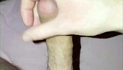 young guy at home massages his cock until he cums solo